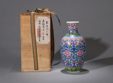 A WHITE GLASS PAINTED ENAMEL 'FLORAL' LANTERN-SHAPED VASE