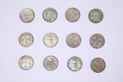 A SET OF TWELVE COINS
