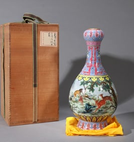 A FAMILLE ROSE 'DEER, CRANE AND SPRING' GARLIC-HEAD SHAPED VASE