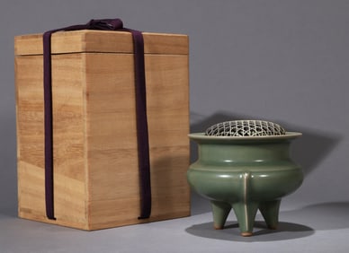 A LONGQUAN CELADON 'PLUM-GREEN' TRIPOD CENSER