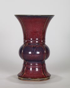 A JUN FLORAL BEAKER