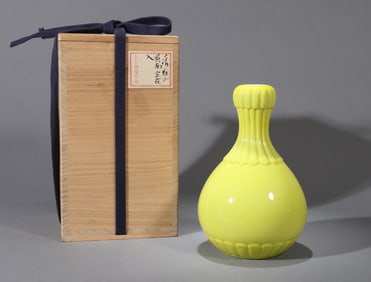 A LEMON-YELLOW GLAZED CHRYSANTHEMUM-LOBED GARLIC-HEAD SHAPED VASE