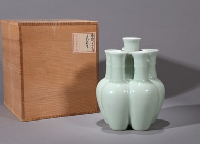 A PALE CELADON GLAZED VASE