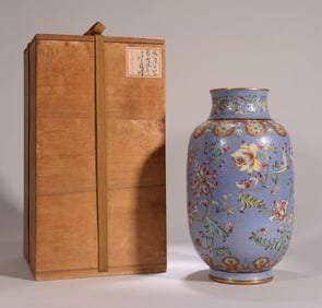 A BLUE-GROUND FAMILLE ROSE 'FLORAL' LANTERN-SHAPED VASE