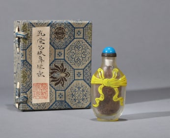 A TRANSPARENT YELLOW-OVERLAY SNUFF BOTTLE