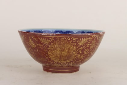 A RED-GROUND GILT-DECORATED BOWL