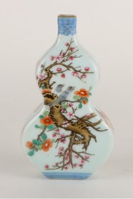 A FAMILLE ROSE 'FLOWERS AND BIRDS' GOURD-SHAPED MOONFLASK