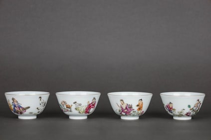 A SET OF FAMILLE ROSE 'FIGURES' CUPS
