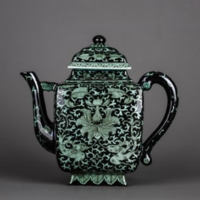 A BLACK-GROUND GREEN 'INTERLOCKING LOTUS' TEAPOT