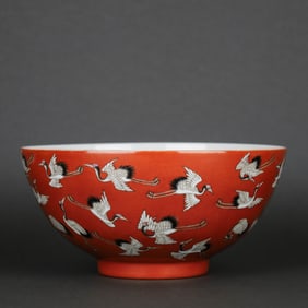 A CORAL-RED GROUND 'HUNDRED CRANES' BOWL
