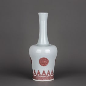 A COPPER-RED 'ROUNDEL FLOWERS' BELL-SHAPED VASE