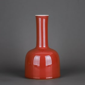 A RED-GLAZED BELL-SHAPED VASE
