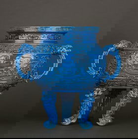 A PEACOCK-BLUE GLAZED CARVED 'BEAST MASK' TRIPOD CENSER