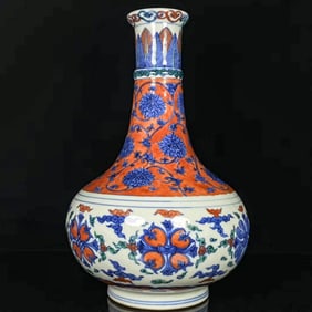 A BLUE AND WHITE WITH DOUCAI 'INTERLOCKING FLOWERS' VASE