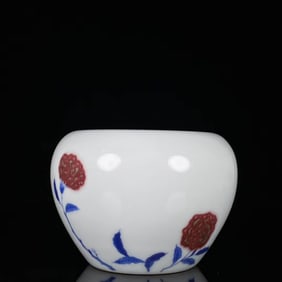 A BLUE AND WHITE WITH COPPER-RED 'FLOWERS' BRUSH WASHER