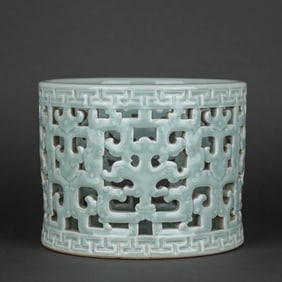 A CELADON OPENWORK BRUSH POT