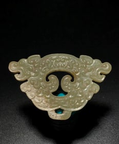 A HETIAN JADE 'TWIN DRAGONS' PENDANT