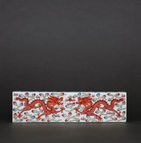 A FAMILLE ROSE WITH IRON-RED 'TWIN DRAGONS CHASING PEARL' PAPERWEIGHT