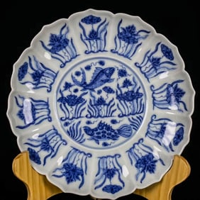 A BLUE AND WHITE 'FISH AND ALGAE' DISH