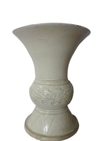 A DING TYPE FLORAL BEAKER