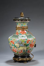A WUCAI 'BABAO AND AUSPICIOUS BEASTS' VASE