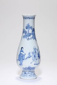 A BLUE AND WHITE 'FIGURE SCENE' KUNDIKA