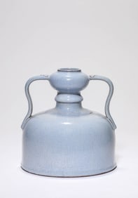 A CELADON GOURD SHAPED JAR