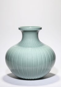 A PALE CELADON GLAZED JAR