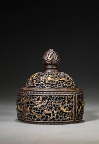 A TIBETAN IRON AND GOLD-INLAID MASTER'S RELIQUARY SET