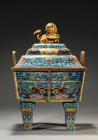 A CLOISONNé ENAMEL 'TAOTIE' CENSER WITH LION FINIAL