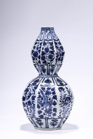 A BLUE AND WHITE 'BABAO AND PHOENIX' VASE