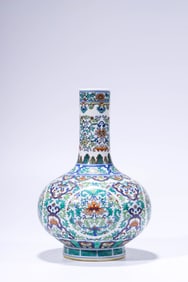 A DOUCAI 'RESERVED PANEL INTERLOCKING FLOWERS' VASE
