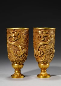 A GROUP OF GILT-BRONZE 'DRAGON' CUPS