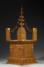 A GILT-BRONZE AND GEM-SET STUPA