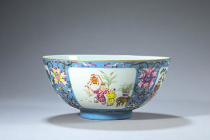 A BLUE-GROUND FAMILLE-ROSE 'RESERVED PANEL CHILDREN AT PLAY' BOWL
