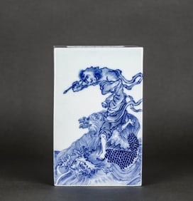 A BLUE AND WHITE 'FIGURE' BRUSH POT