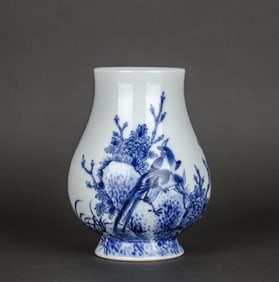 A BLUE AND WHITE 'PHEASANT AND PEONY' VASE