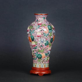 A RUBY-RED GROUND FAMILLE ROSE VASE