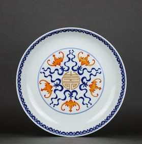 A BLUE AND WHITE WITH IRON-RED 'FIVE BATS AROUND SHOU' DISH