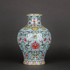A TURQUOISE-GREEN GROUND FAMILLE ROSE 'ROSETTES'  VASE