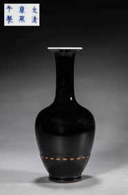 A BLACK-GLAZED CHRYSANTHEMUM-SHAPED VASE