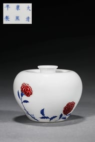 A BLUE AND WHITE WITH UNDERGLAZED RED 'FLORAL' APPLE-SHAPED JAR