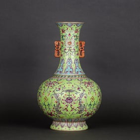A GREEN-GROUND FAMILLE ROSE 'DRAGON' VASE