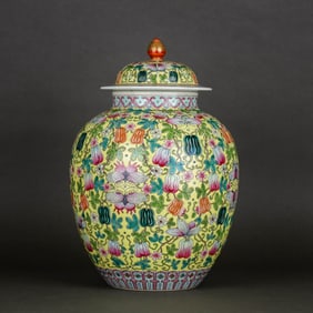 A YELLOW-GROUND FAMILLE ROSE 'MELON VINES' COVERED JAR