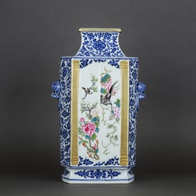 A BLUE-AND-WHITE AND FAMILLE ROSE 'FLOWERS AND BIRDS' VASE