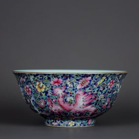 A BLUE-GROUND FAMILLE ROSE 'PHOENIX AND FLOWERS' BOWL