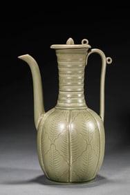 A LONGQUAN CELADON INCISED 'FLORAL' EVER
