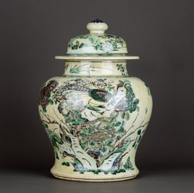A YELLOW-GROUND SANCAI 'PHEASANT AND PEONY' JAR