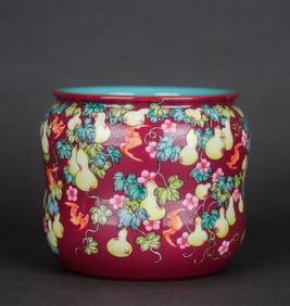 A RUBY RED-GROUND FAMILLE ROSE 'FRUITS' JAR