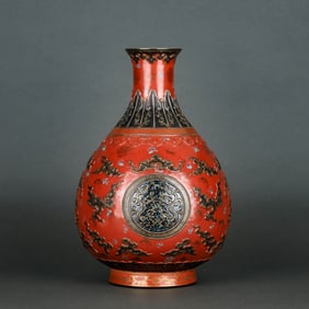 A BRONZE-EFFECT RED-GROUND CARVED WITH GILT 'AUSPICIOUS CLOUDS AND CHI DRAGON' YUHUCHUNPING